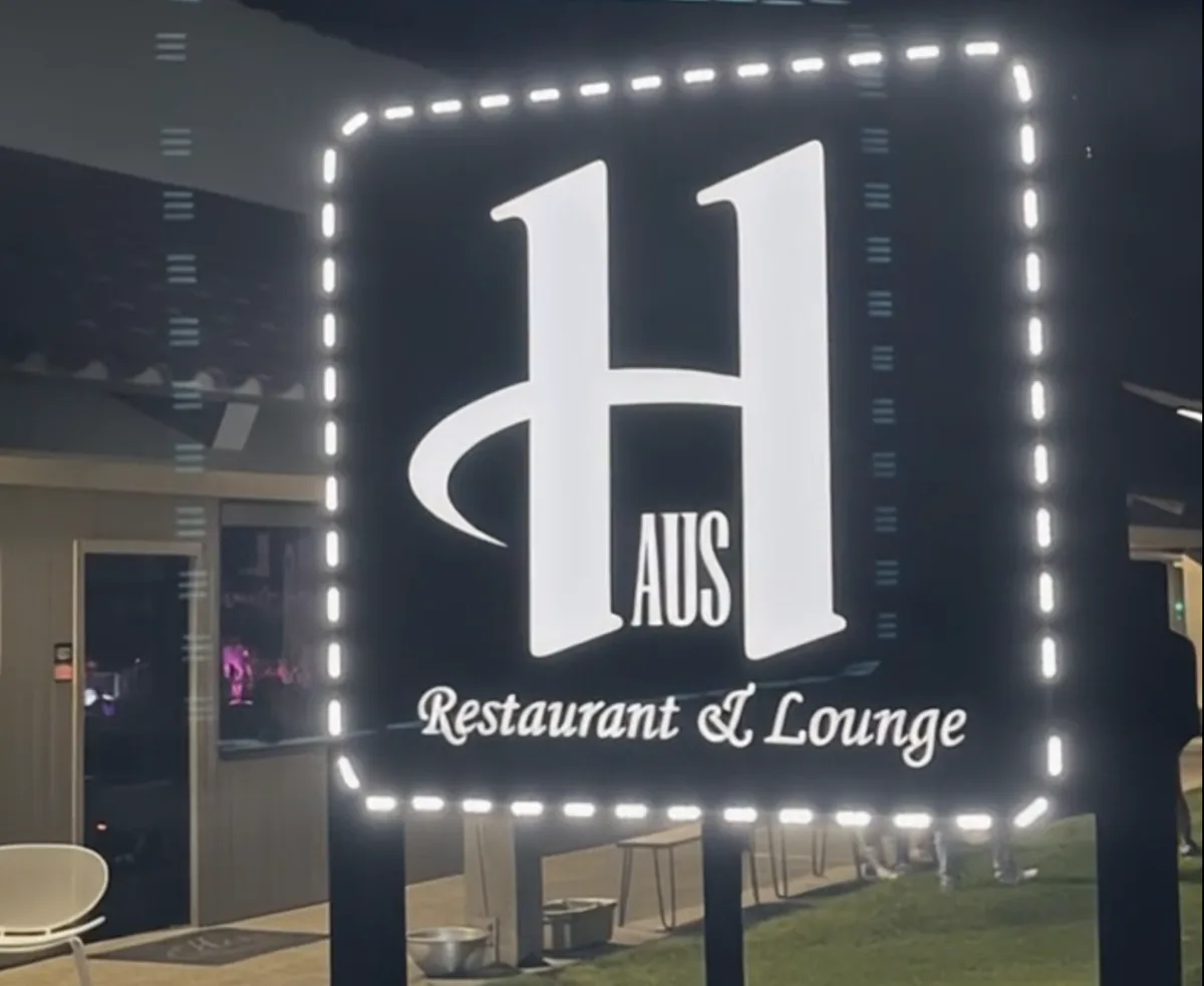 The illuminated sign of The Haus Lounge, the Korean soju bar in La Mirada run by the same team.