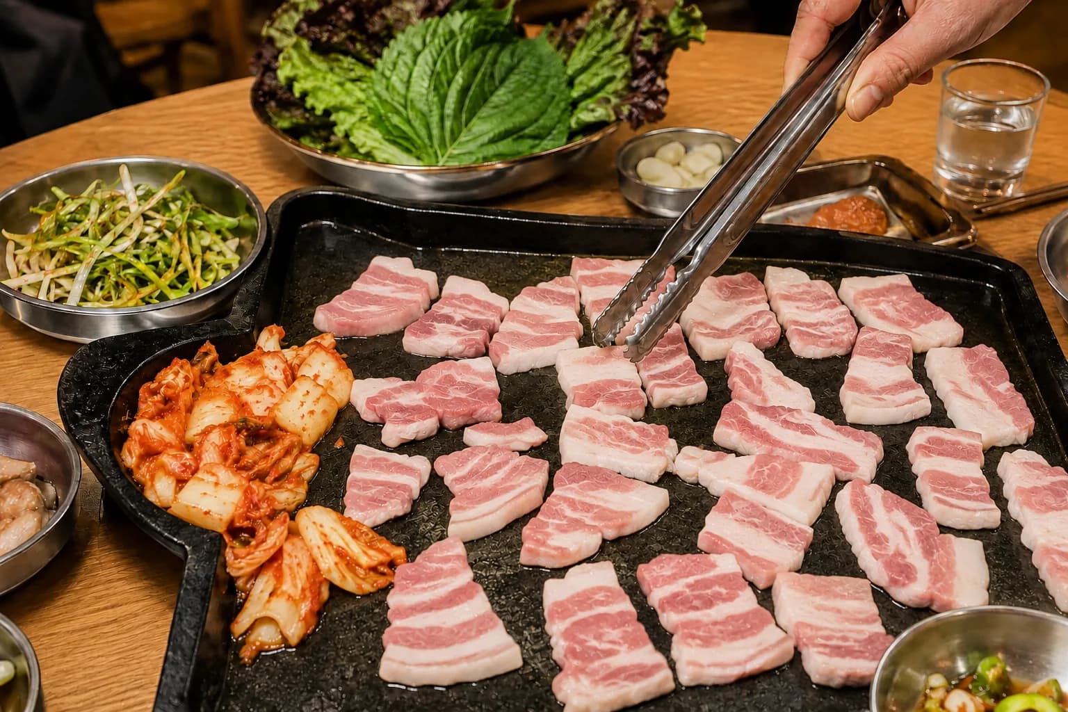 AI concept of a pork belly and kimchi table. Not a photograph of the actual restaurant.